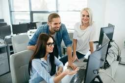 depositphotos_185031644-stock-photo-it-office-people-working-at (1)