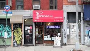Permacut Hairstylists with scissors-and-hair P, First Ave, Manhattan